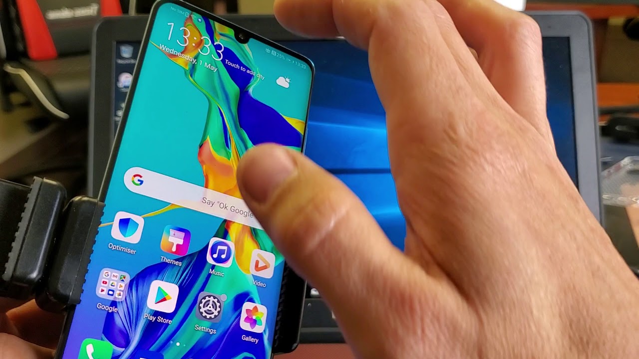 Jak przerzucić zdjęcia z telefonu Huawei p30 na komputer?